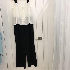 Jump Suit — elegant black and cream. New without tags.
